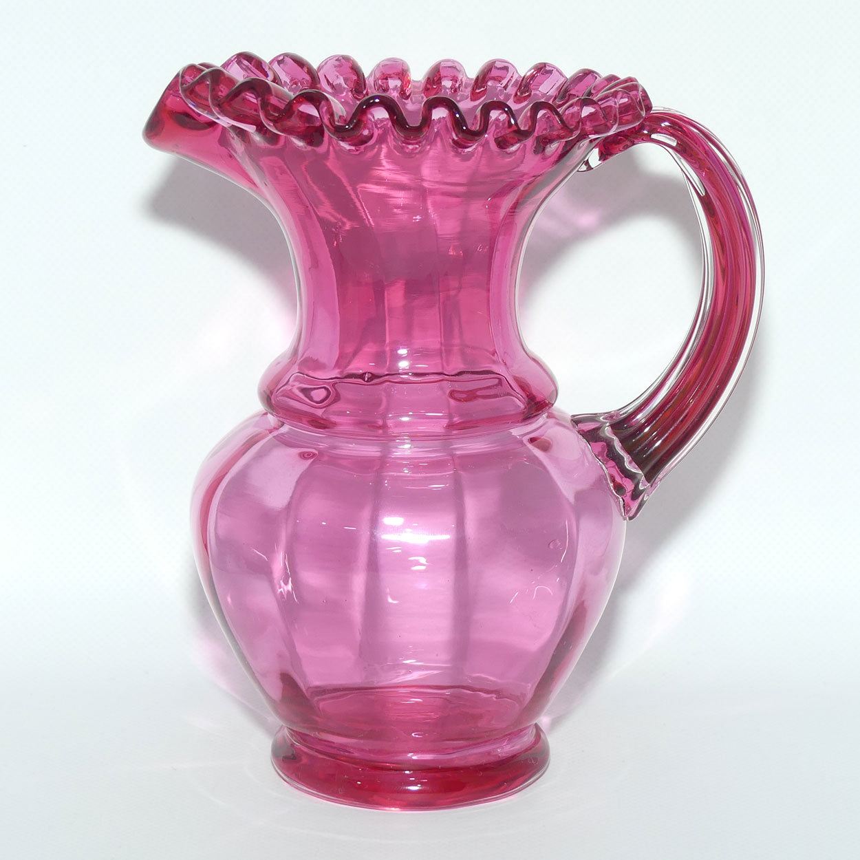 Victorian era Cranberry Glass frilled top jug | 20cm tall