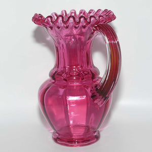 Victorian era Cranberry Glass frilled top jug