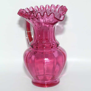 Victorian era Cranberry Glass frilled top jug