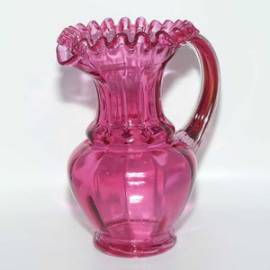 Victorian era Cranberry Glass frilled top jug