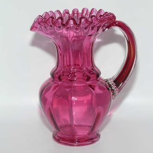 Victorian era Cranberry Glass frilled top jug