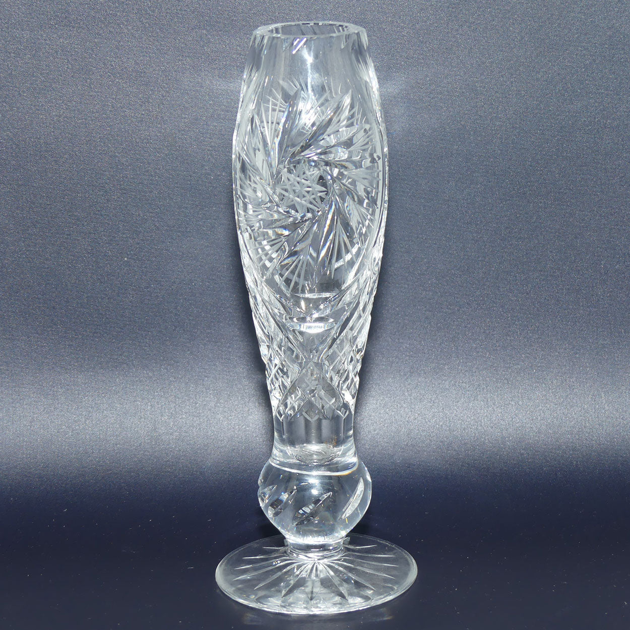 Heavy Crystal slender shape bud vase with pinwheel decoration