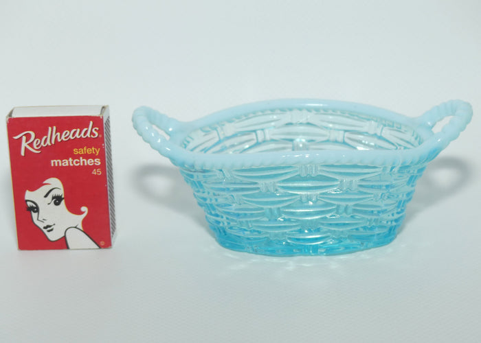 Turquoise and Vaseline Glass twin handle basket | Davidson