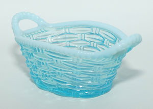 Turquoise and Vaseline Glass twin handle basket | Davidson