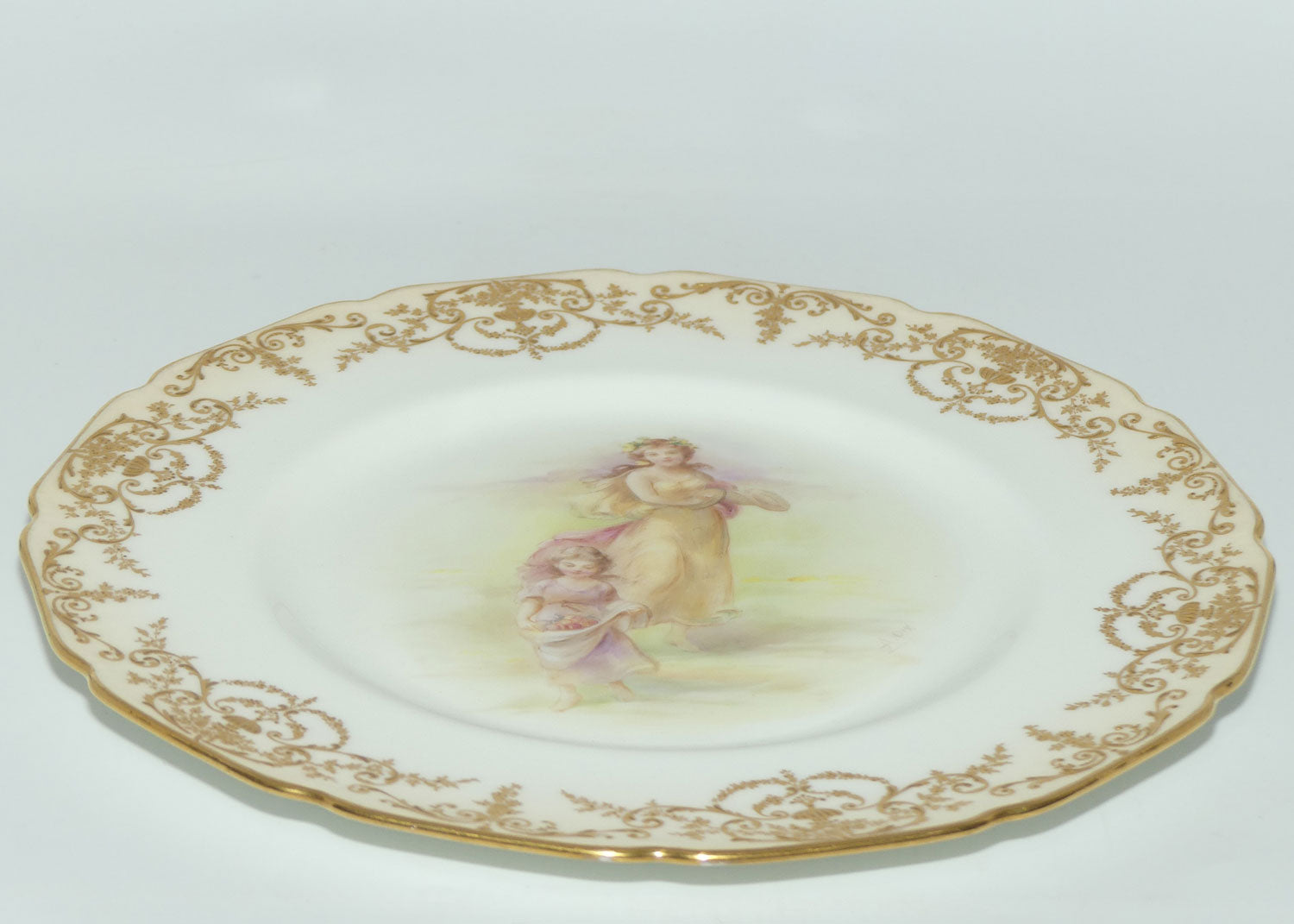 Royal Doulton hand painted and gilt Young Maiden and Child with fruit plate (Dix)