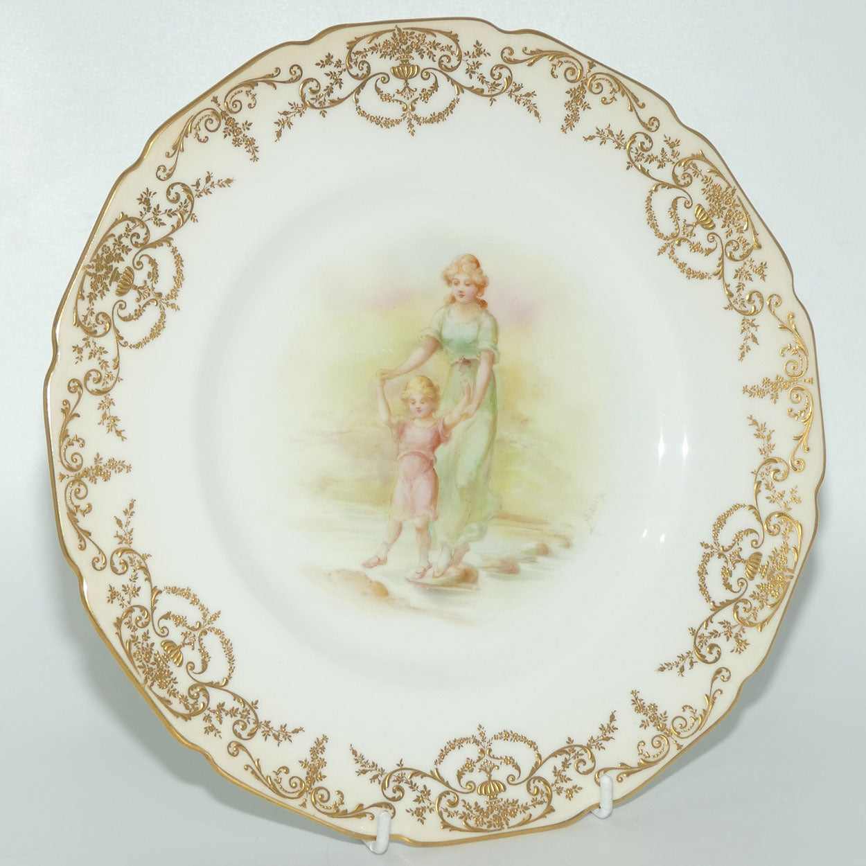 Royal Doulton hand painted and gilt Young woman and Child walking over stepping stones plate (Dix)