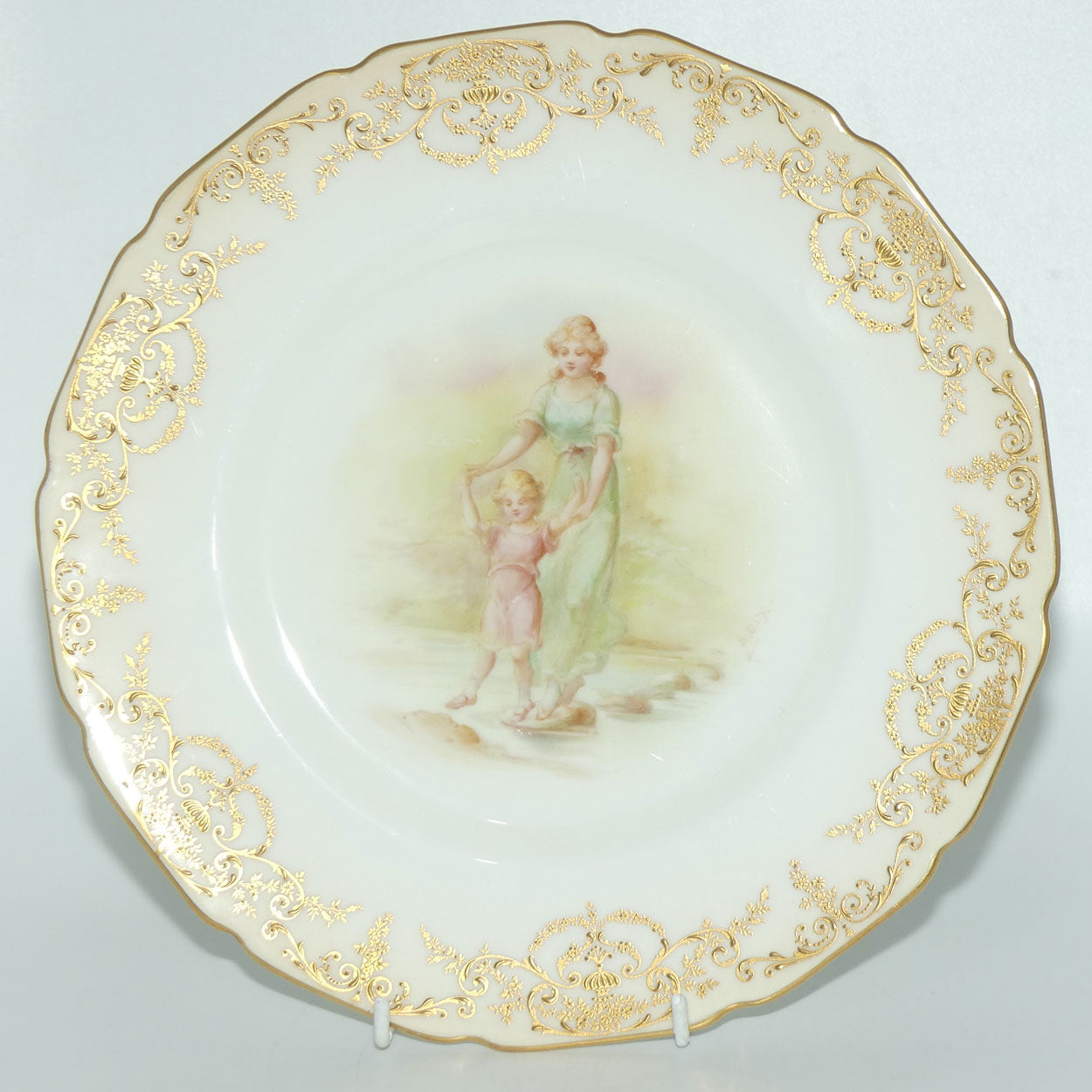 Royal Doulton hand painted and gilt Young woman and Child walking over stepping stones plate (Dix)