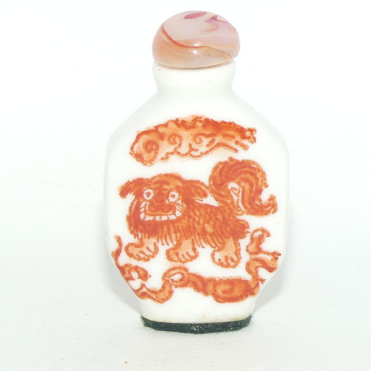 Chinese snuff bottle with red stone stopper | Dog of Fo