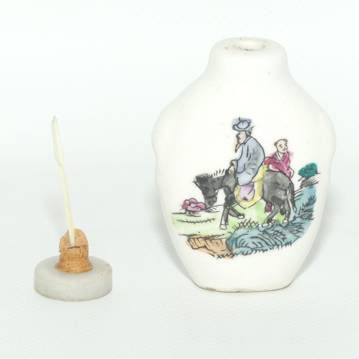 Chinese Man on Donkey pattern Snuff Bottle | Grey stone stopper