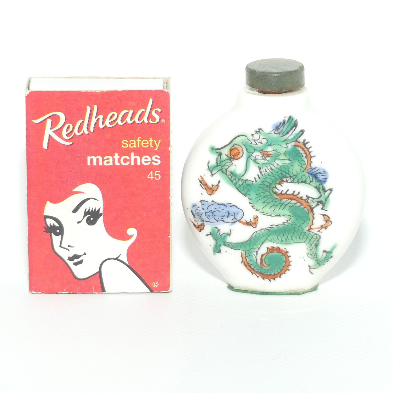 Chinese round shape snuff bottle with greenstone stopper | Dragon Scene