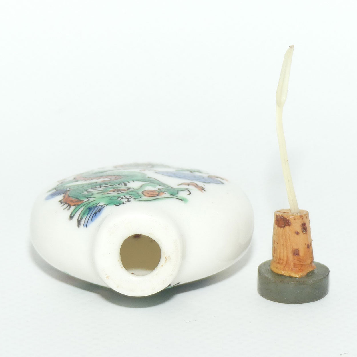 Chinese round shape snuff bottle with greenstone stopper | Dragon Scene