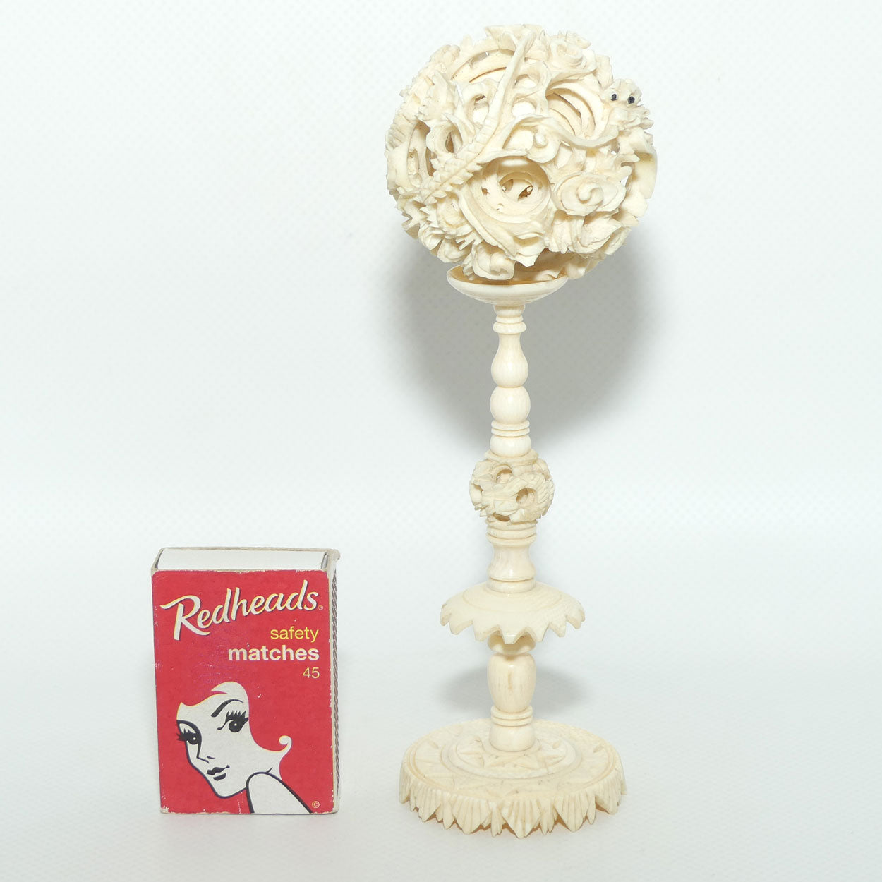 Carved Ivory Puzzle Ball on stand | Dragon with Black Eyes | 16.5cm tall
