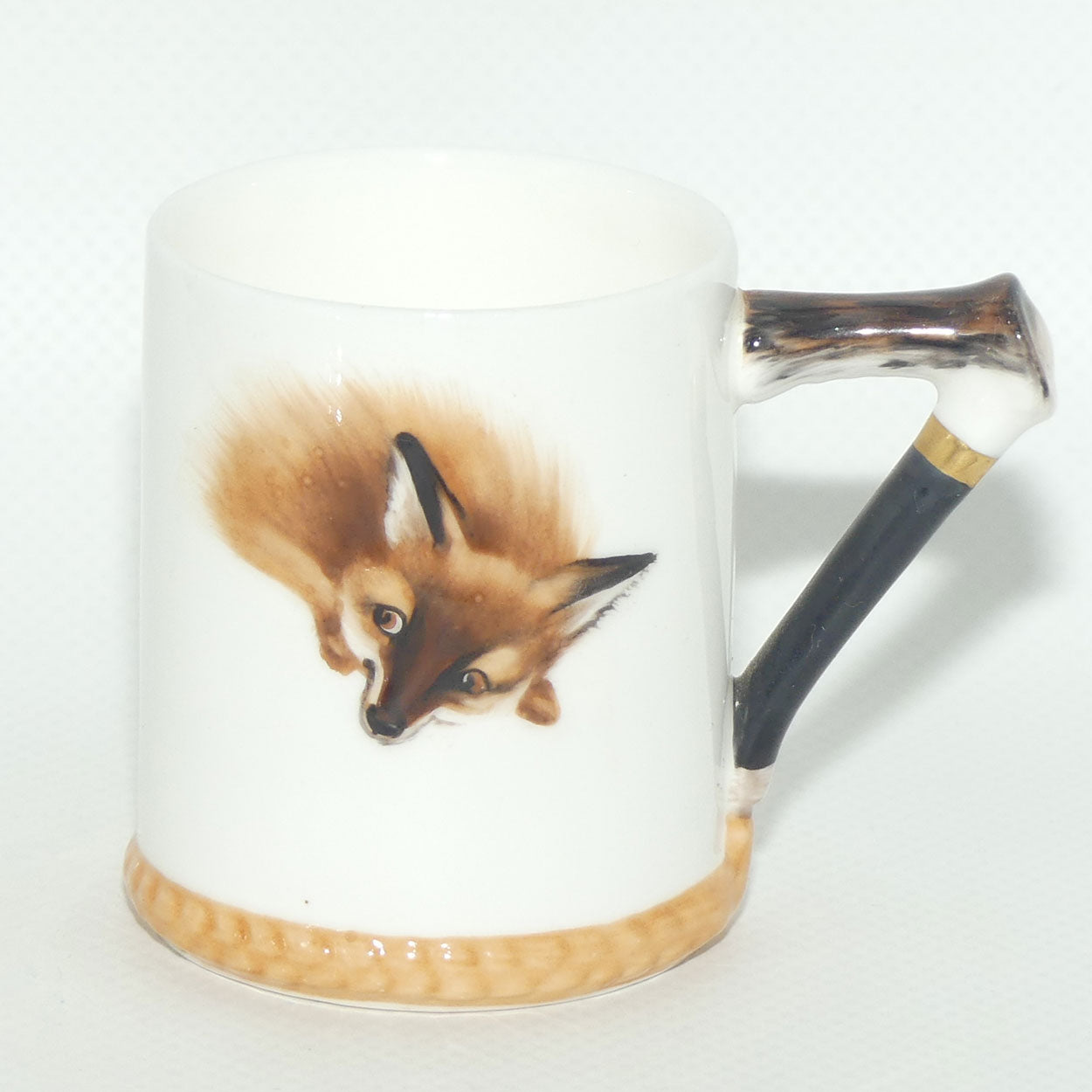 Royal Doulton Reynard the Fox coffee cup and saucer H4927 | Fox Lying