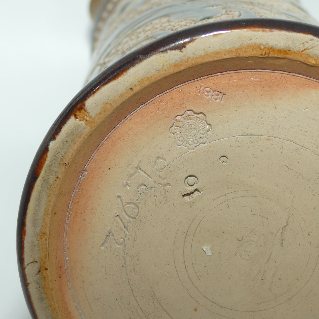 Doulton Lambeth Louisa E Edwards stoneware ale jug with applied beads and incised foliage