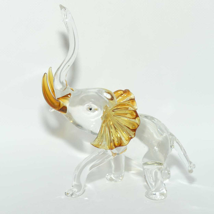 Clear and Amber Murano Glass Elephant with Trunk in Salute