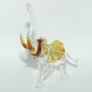 Clear and Amber Murano Glass Elephant with Trunk in Salute