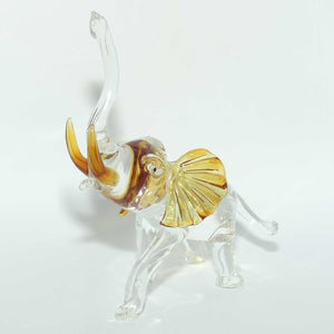 Clear and Amber Murano Glass Elephant with Trunk in Salute