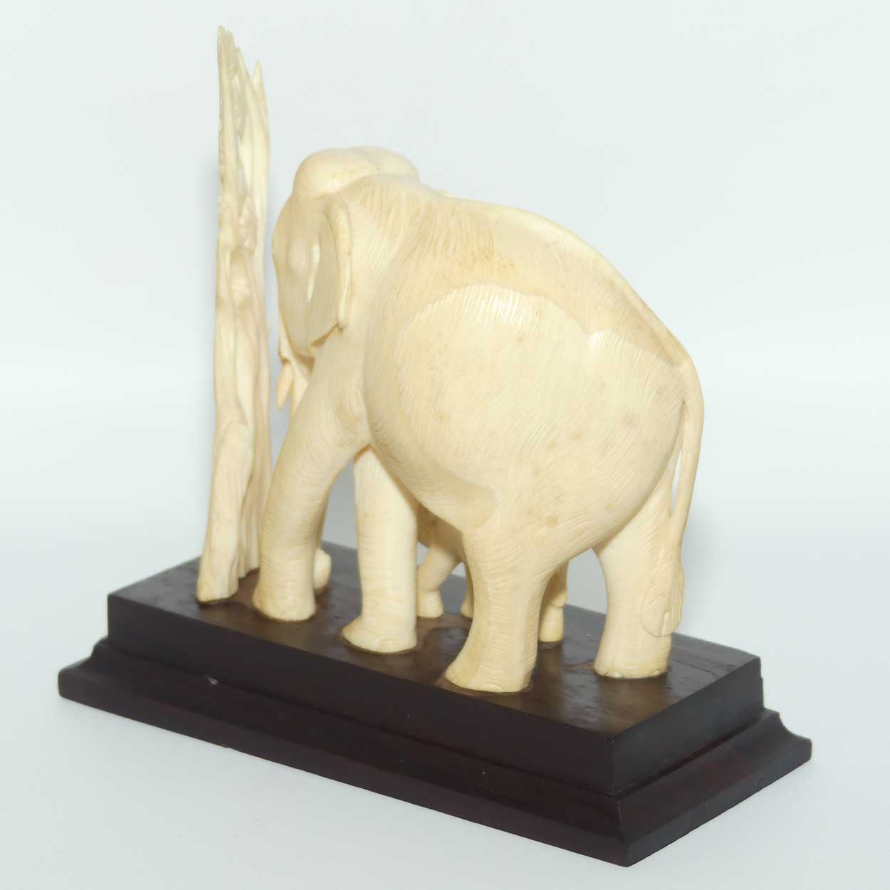 Carved Ivory figure of Mother Elephant and Calf on Rosewood Base