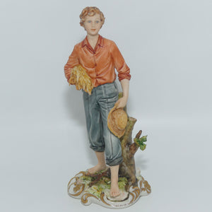 Capodimonte figure signed Sandro | Farmer Boy with Wheat