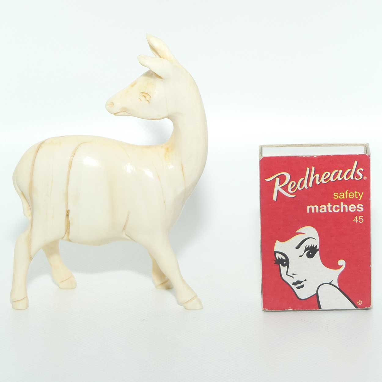 Carved Ivory Figure of a Female Goat