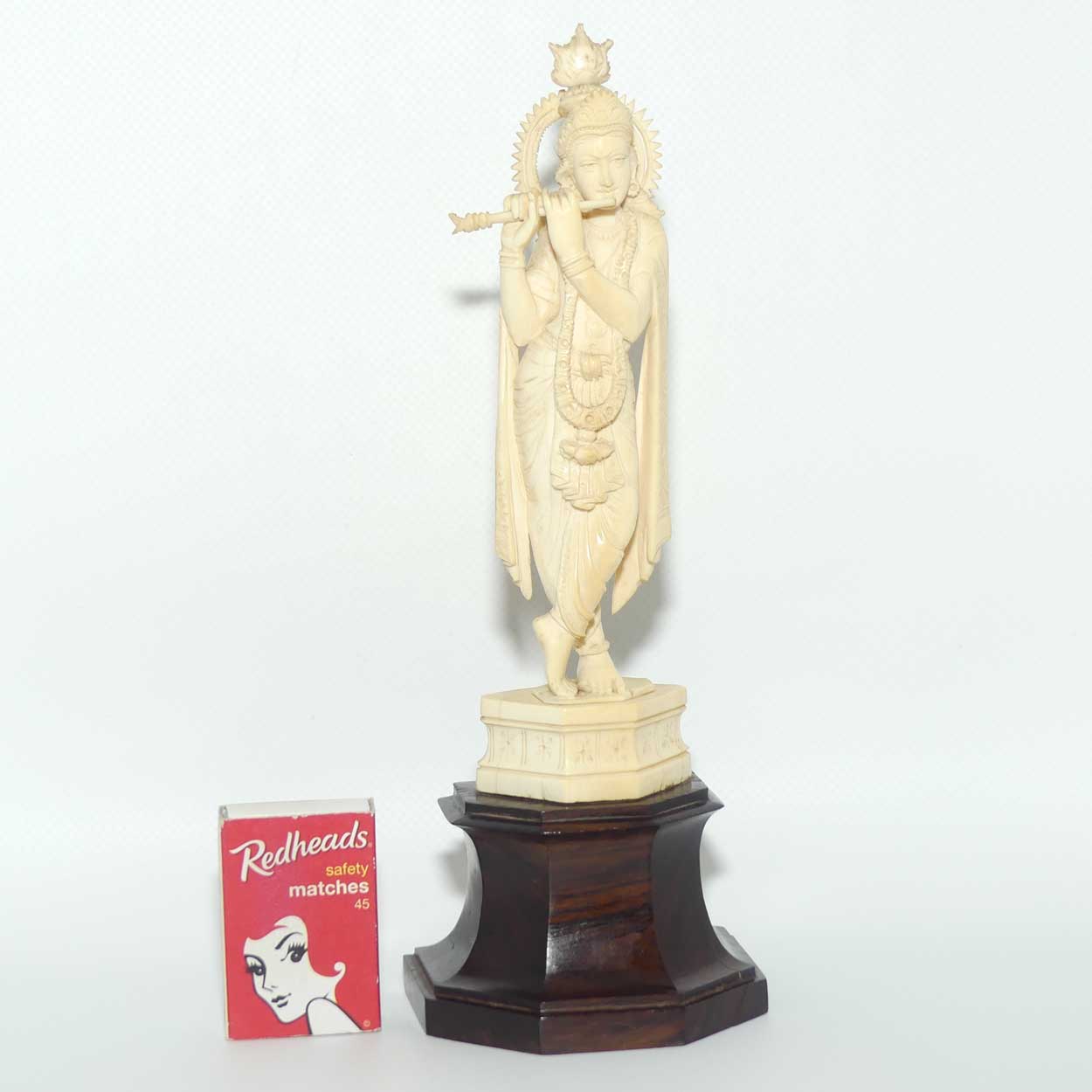 Carved Ivory figure of Hindi Deity Lord Krishna playing a Flute