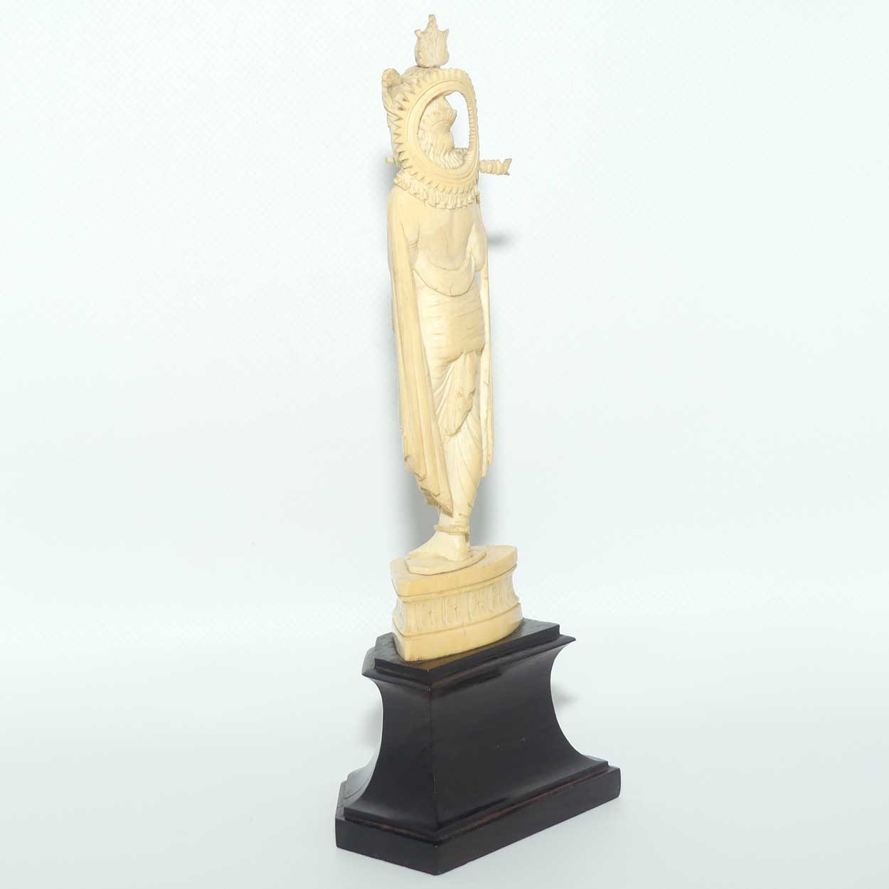 Carved Ivory figure of Hindi Deity Lord Krishna playing a Flute