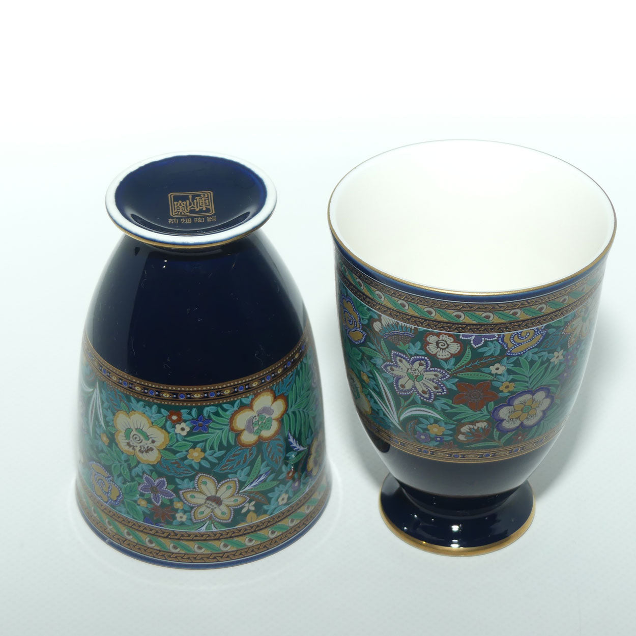 Pair of Japanese Tea Beakers with elaborate Floral decor