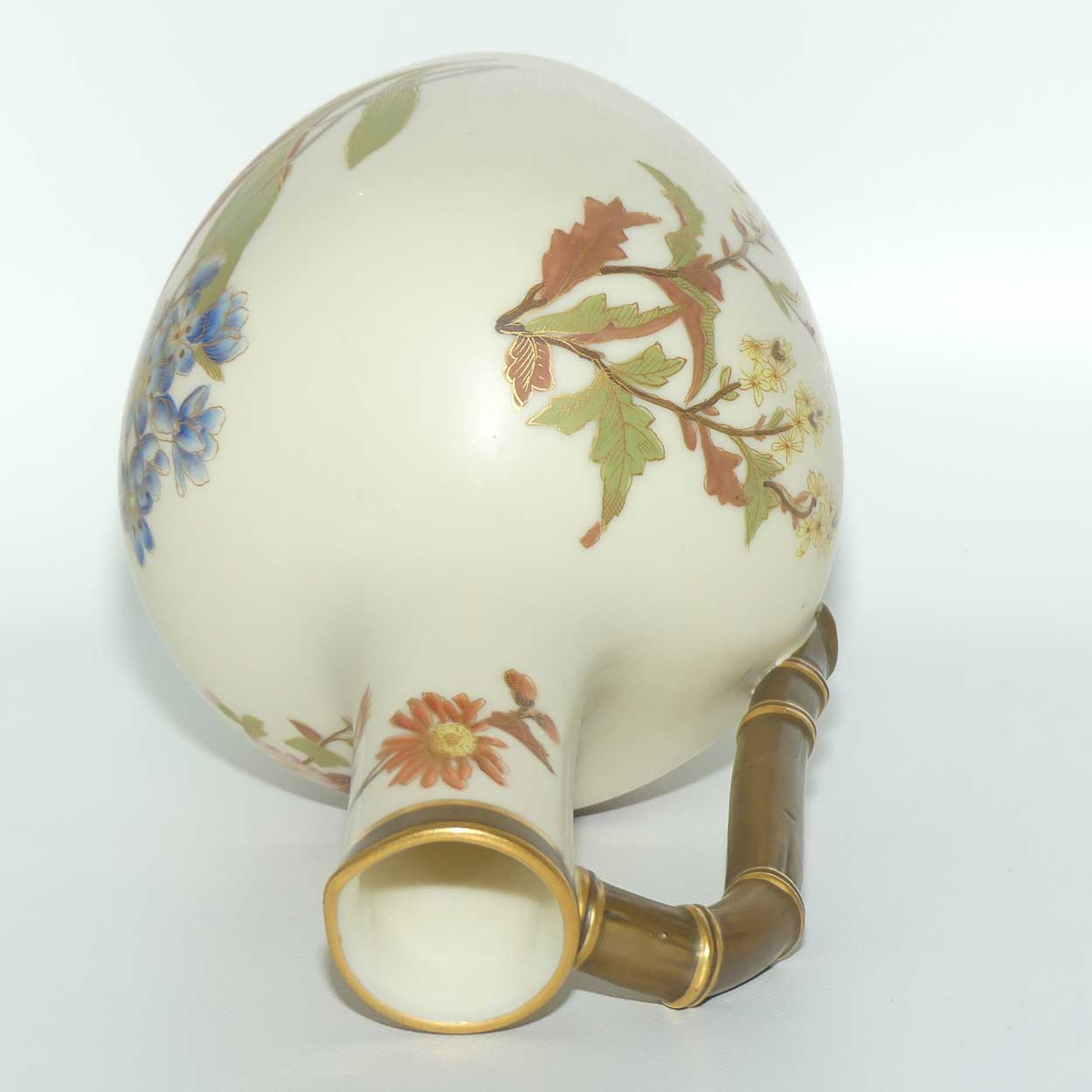 Royal Worcester Blush Ivory and gilt hand painted floral jug with bamboo style handle
