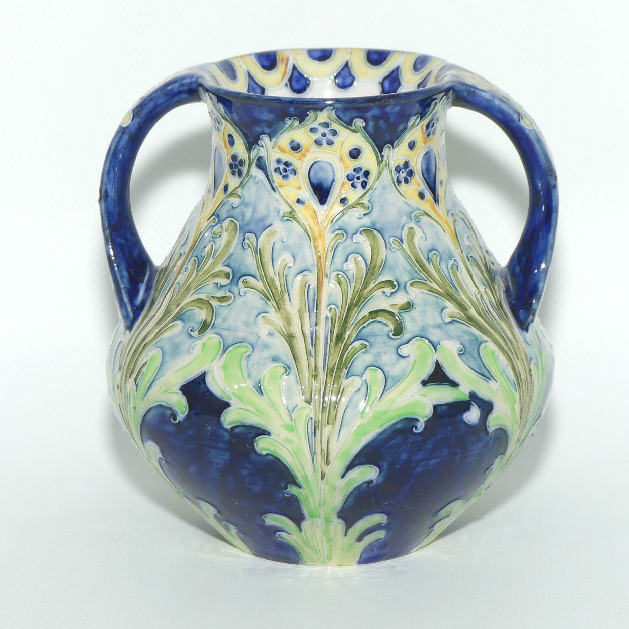 James MacIntyre & Co William Moorcroft Florian Feather and Daisy twin handle vase | M1695
