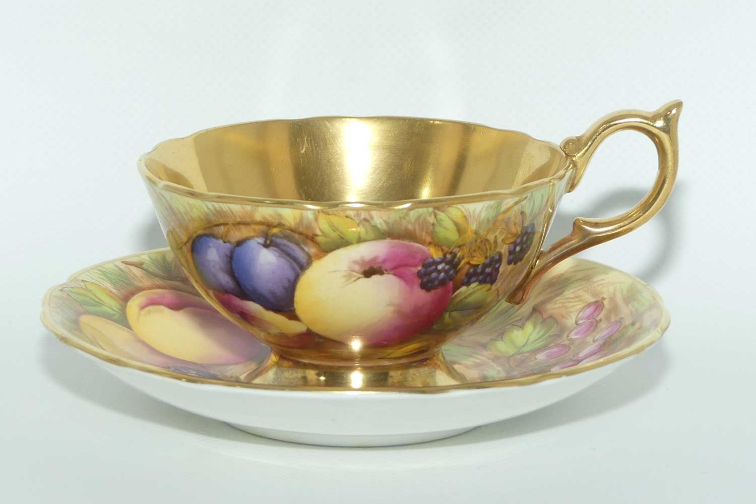 Aynsley Orchard Gold with gilt interior tea duo | signed Jones and Bru