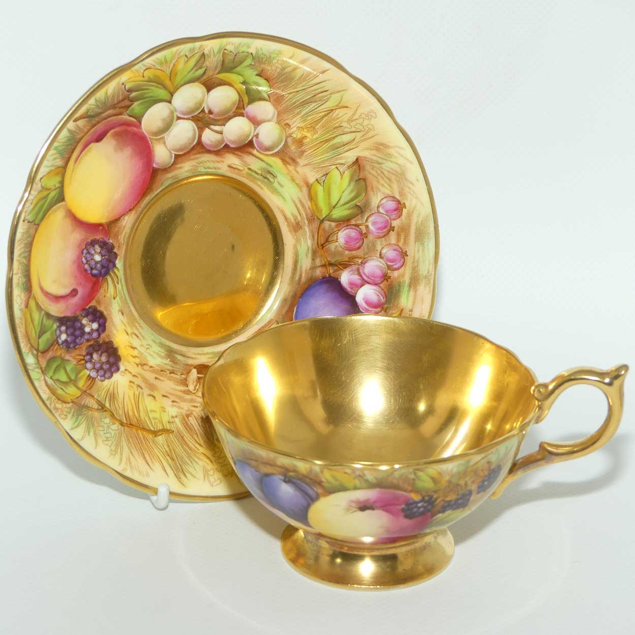 Aynsley Orchard Gold with gilt interior tea duo | signed Jones and Bru