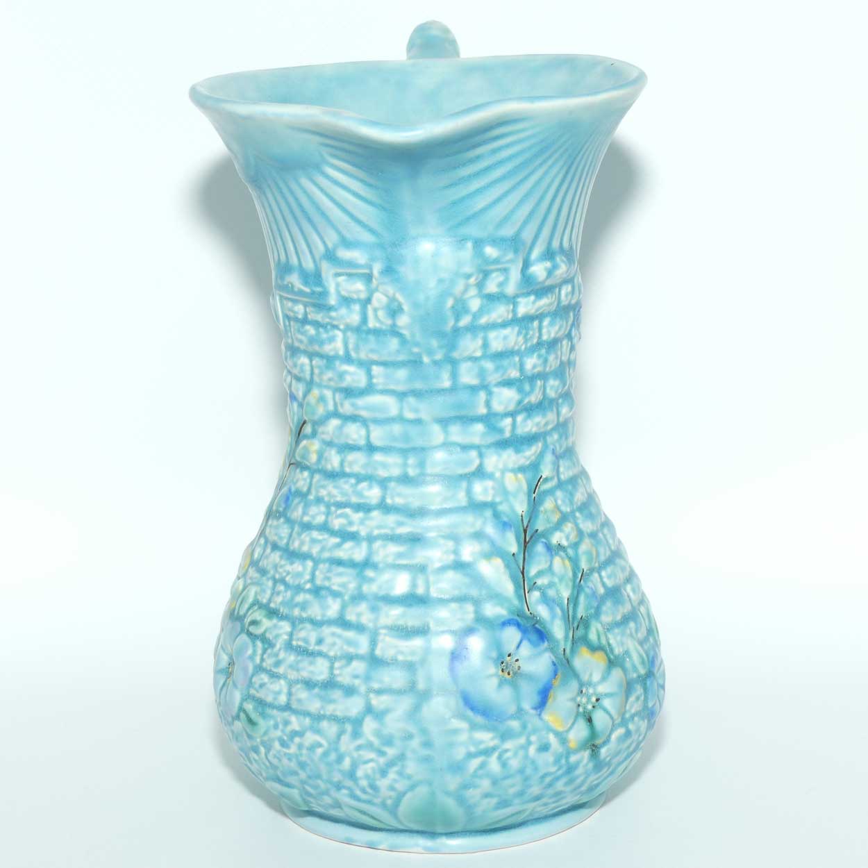 Arthur Woods Garden Wall floral embossed jug | Matt blue Glaze