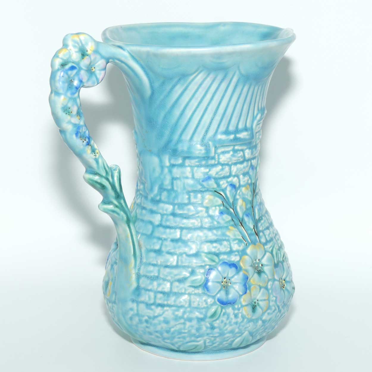 Arthur Woods Garden Wall floral embossed jug | Matt blue Glaze