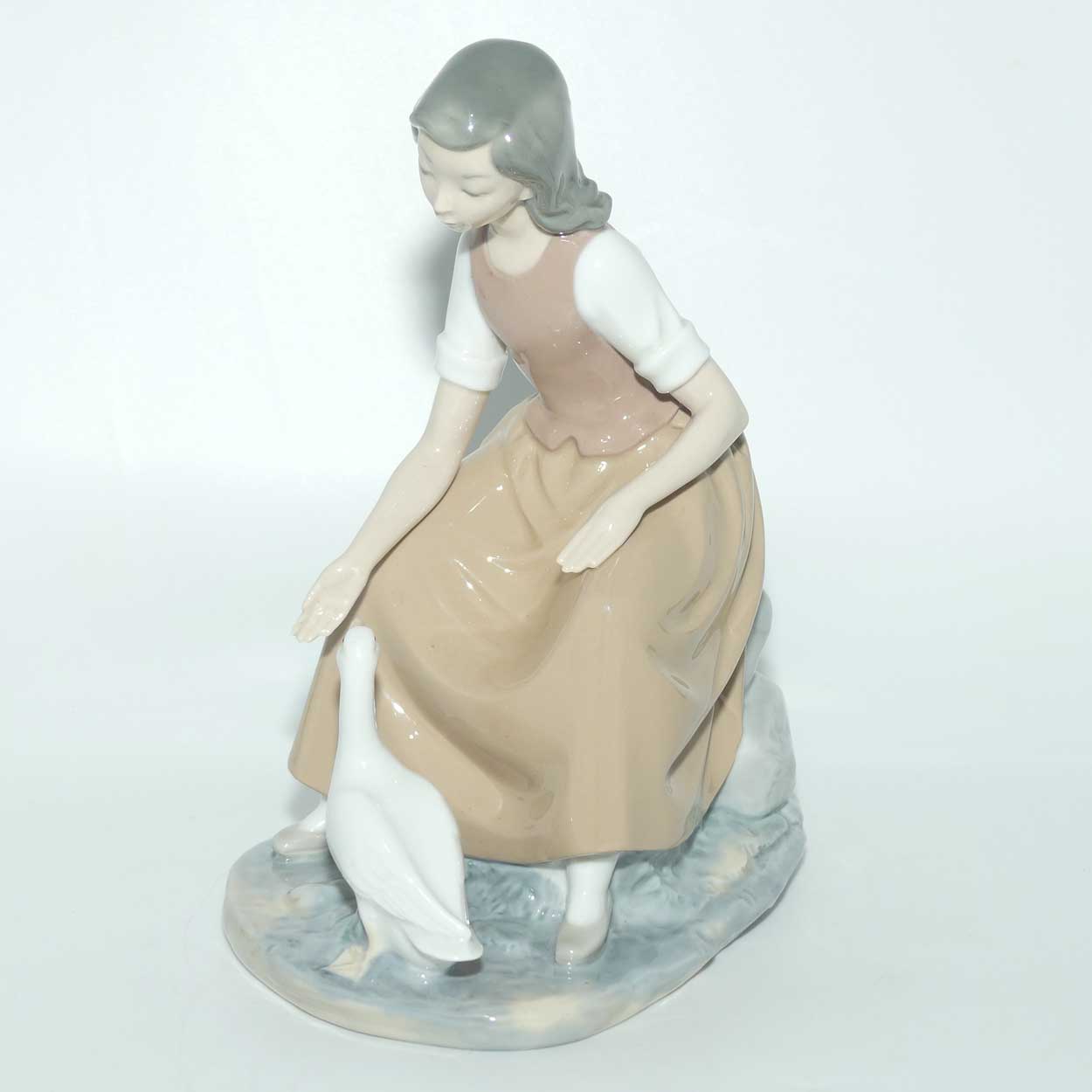 Nao by Lladro figure Seated Girl with Goose | Discontinued LLadro