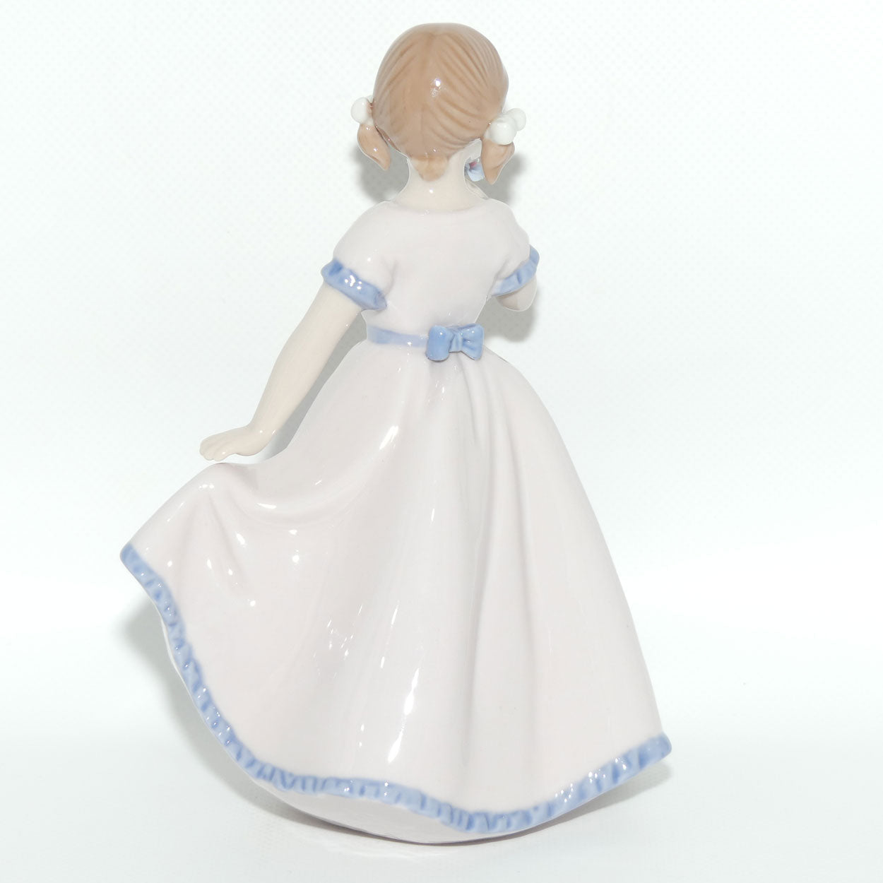 ADORA Cosmos Fine Porcelain | Girl With Flowers Figurine