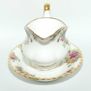 Royal Albert Bone China England Old Country Roses gravy boat and underplate | © 1962 Royal Albert Ltd backstamp