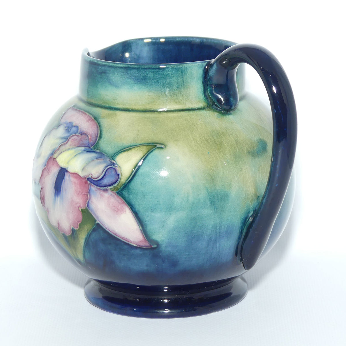 Walter Moorcroft Orchid on Light Green transition to Blue Ground jug