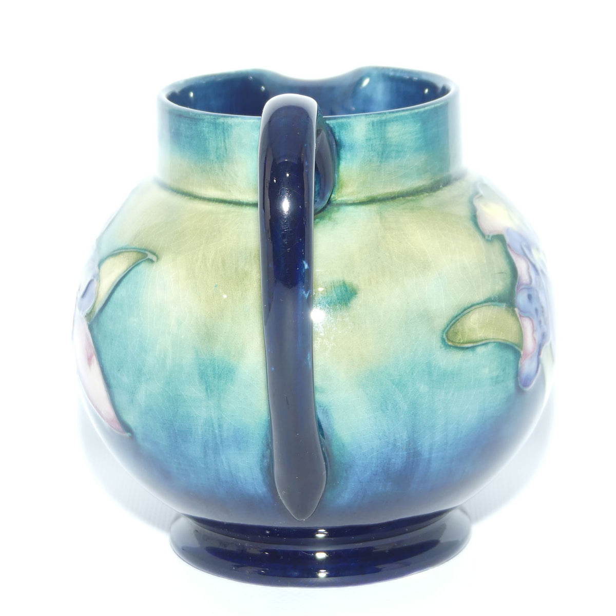 Walter Moorcroft Orchid on Light Green transition to Blue Ground jug
