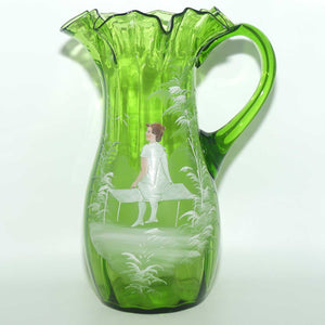 Green Mary Gregory crimped rim glass jug depicting a young girl sitting on bench