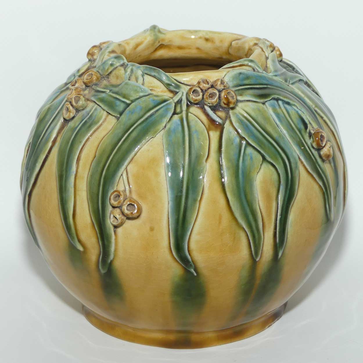 Australian Pottery | Hand Built Gum Nuts and Gum leaves ball vase signed R.W.