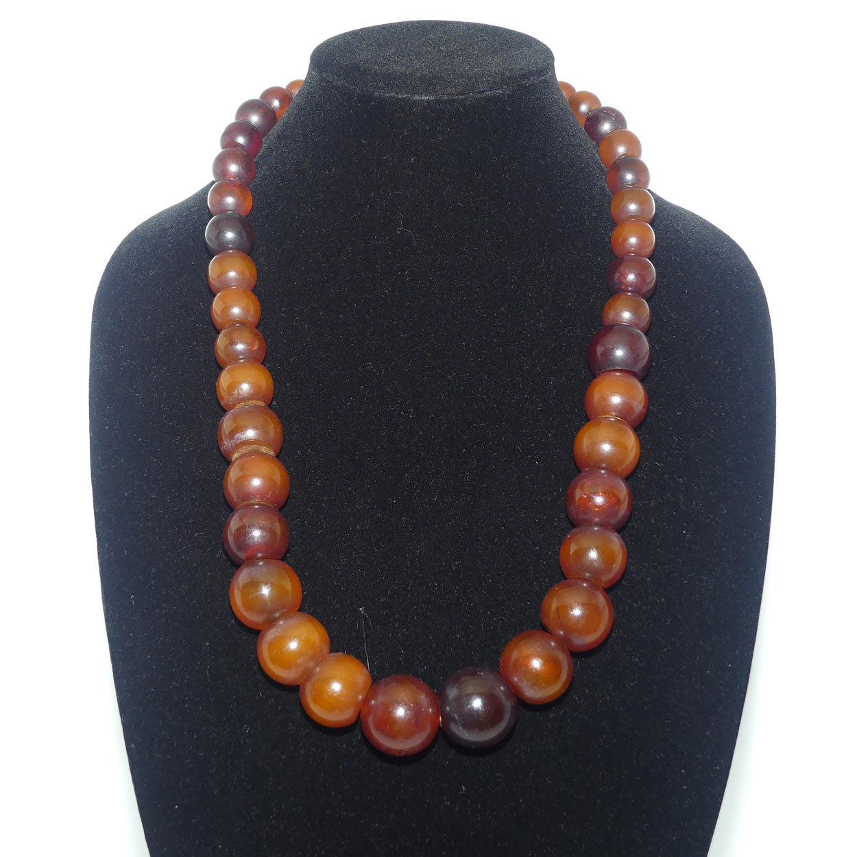 Very Heavy Antique set of Cognac Amber beads - strung on cord | 70cm total length