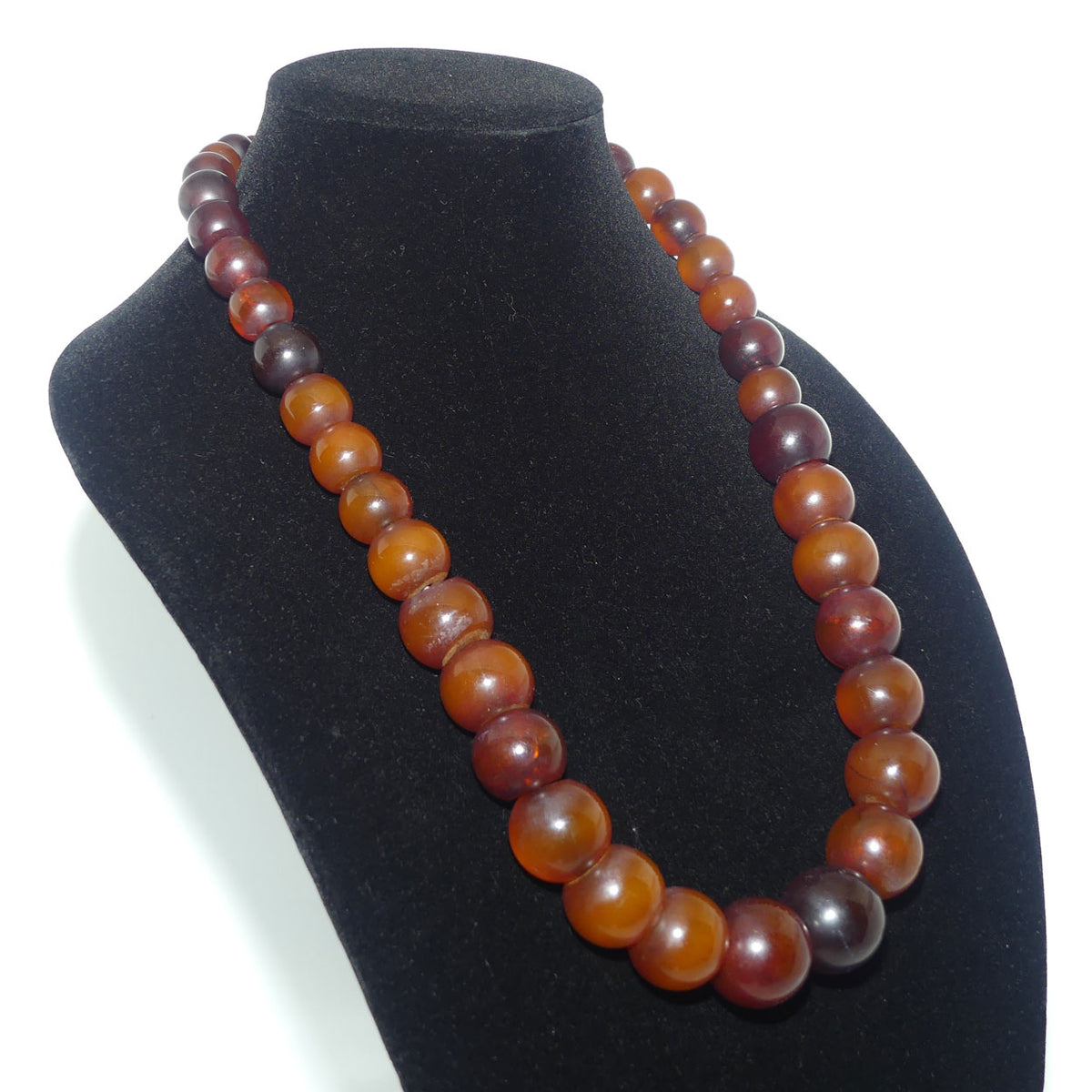 Very Heavy Antique set of Cognac Amber beads - strung on cord | 70cm total length