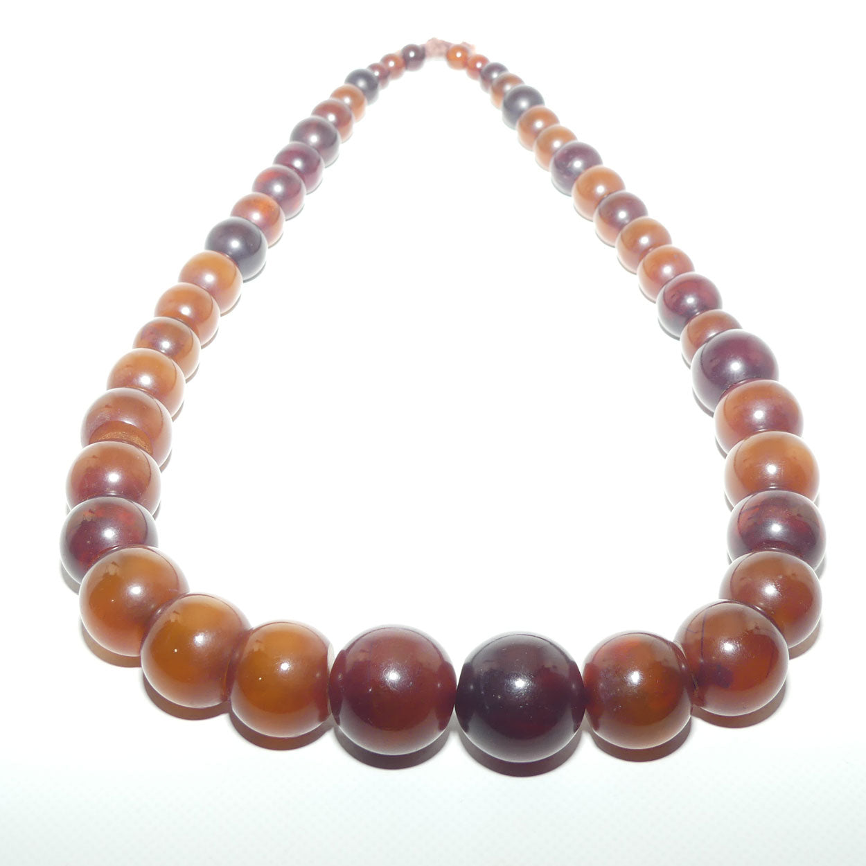 Very Heavy Antique set of Cognac Amber beads - strung on cord | 70cm total length