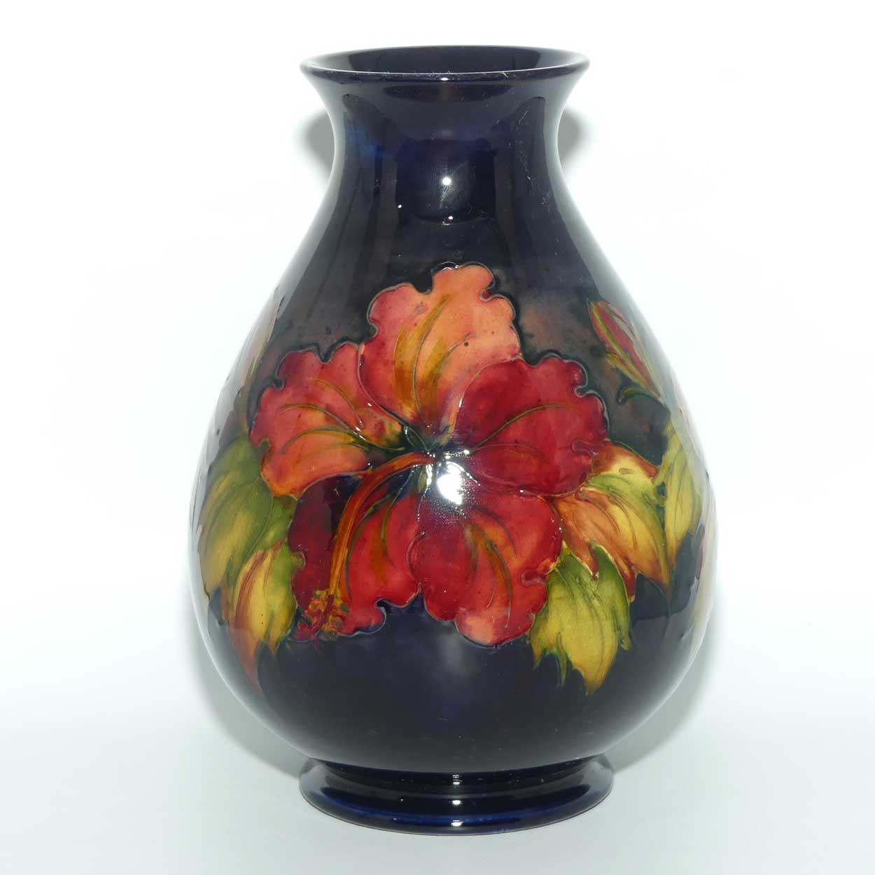 Walter Moorcroft Hibiscus with Flambe Tinted Flowers vase | Shape 7/8