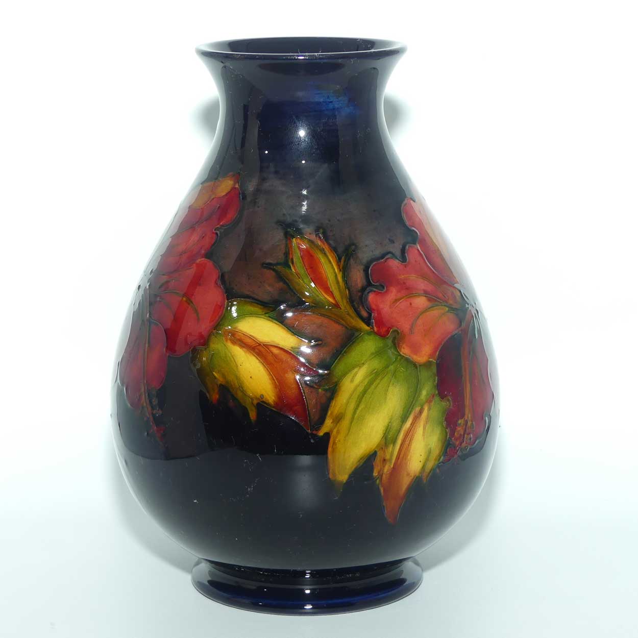 Walter Moorcroft Hibiscus with Flambe Tinted Flowers vase | Shape 7/8