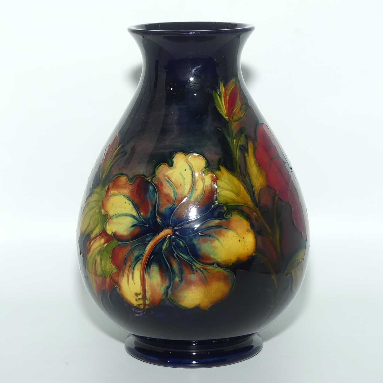 Walter Moorcroft Hibiscus with Flambe Tinted Flowers vase | Shape 7/8
