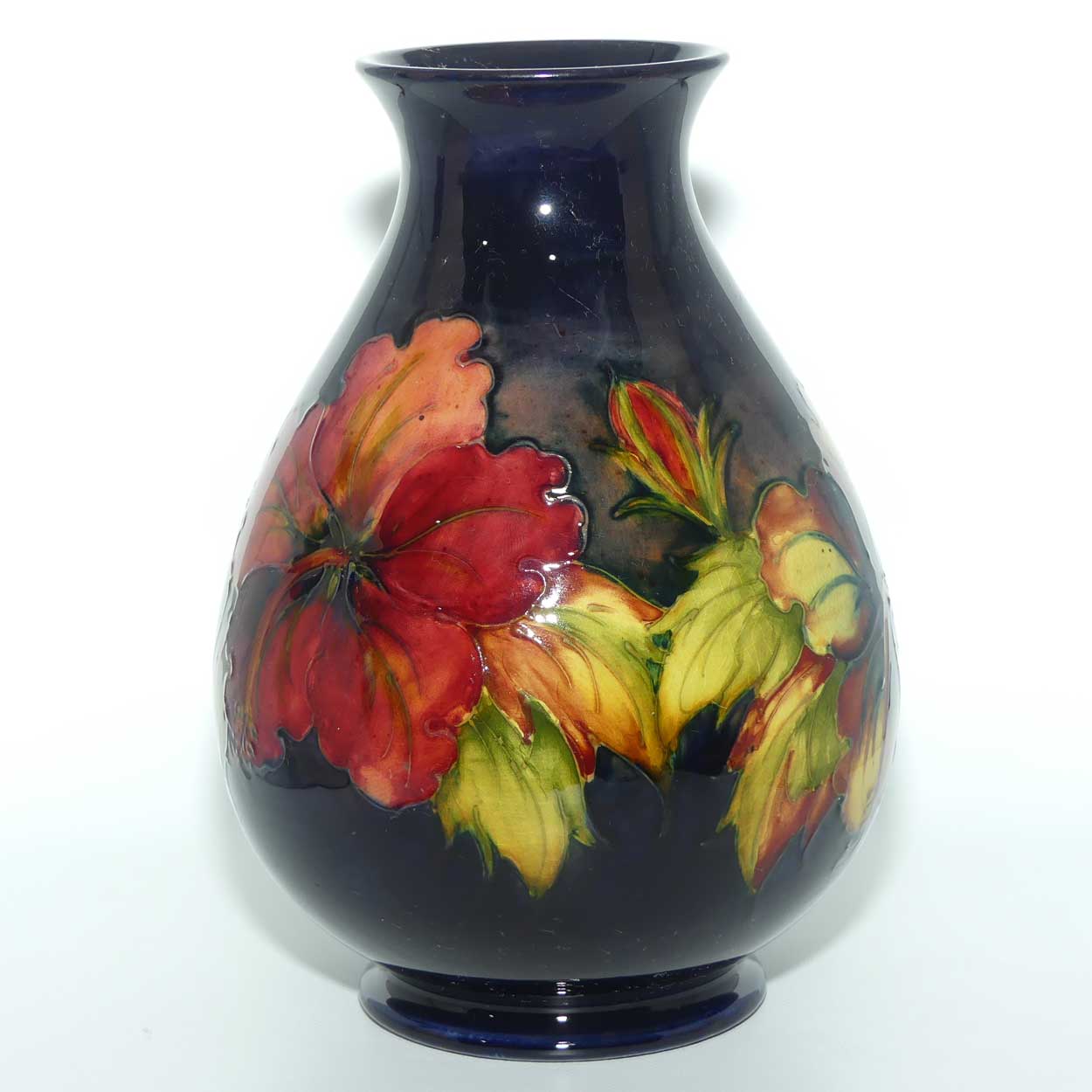 Walter Moorcroft Hibiscus with Flambe Tinted Flowers vase | Shape 7/8