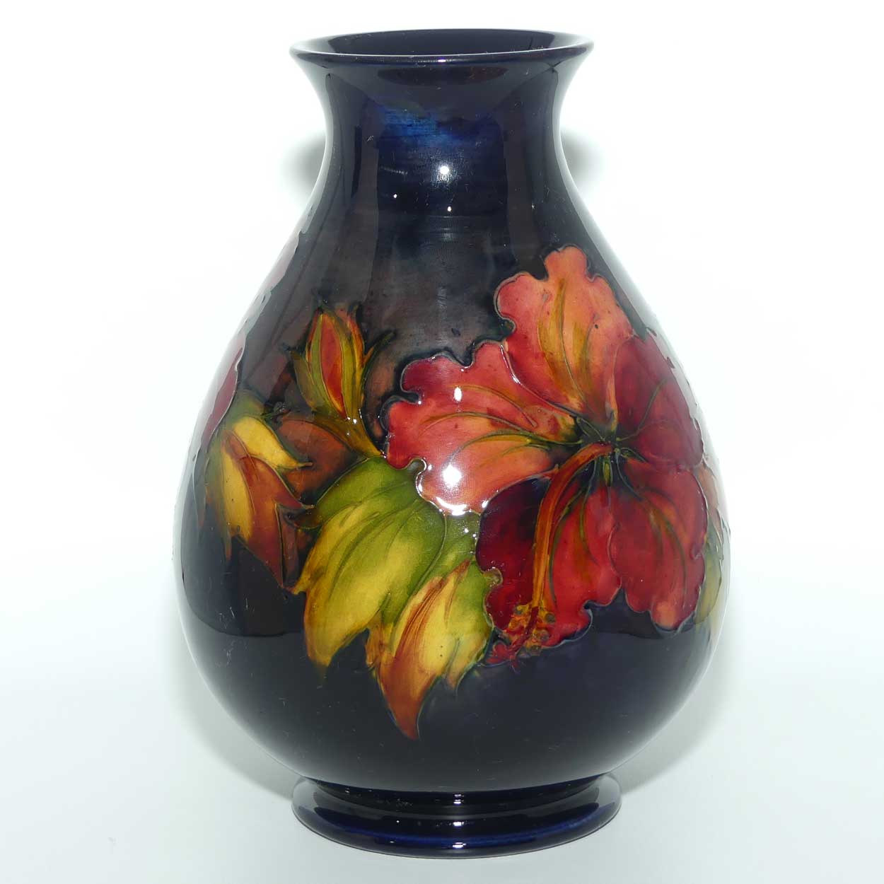 Walter Moorcroft Hibiscus with Flambe Tinted Flowers vase | Shape 7/8