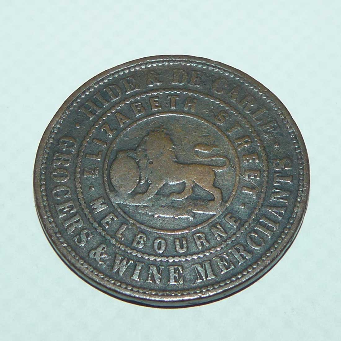 Token | 1 Penny | Hide & De Carle, Grocers & Wine Merchants, Melbourne, Victoria 1857
