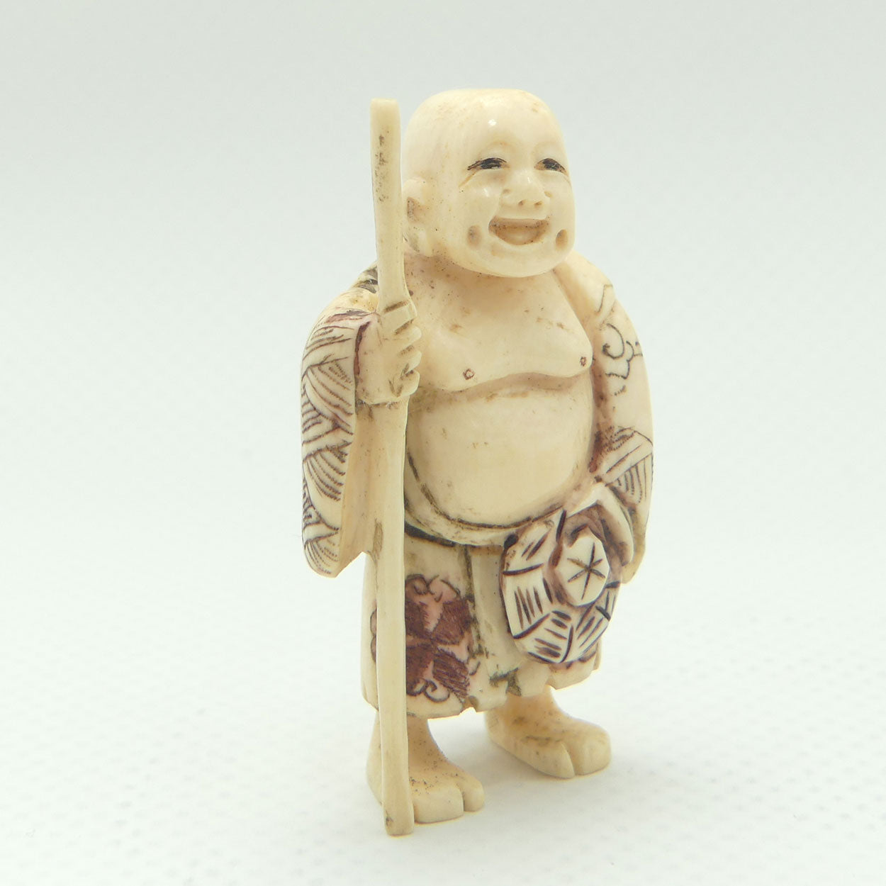 Japanese Carved Ivory Netsuke | Hotei with Staff | signed